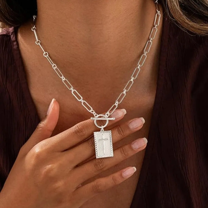 Bold heavy-link paperclip chain necklace with striking cross pendant, silver-tone statement jewelry