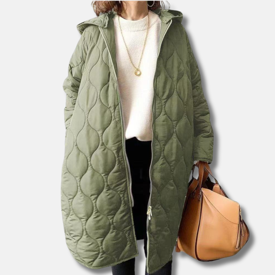 Women's oversized long quilted hooded jacket with zip closure, cozy winter outerwear in relaxed fit
