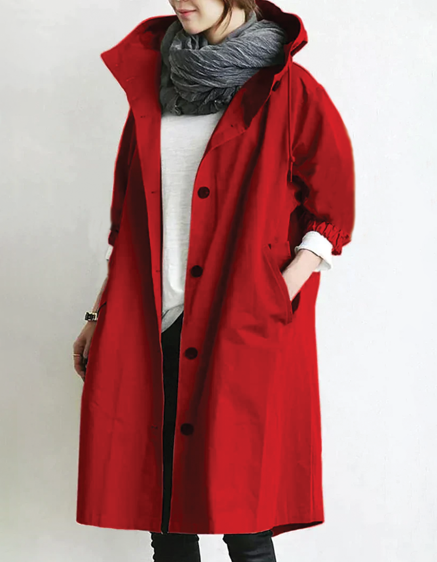 Beige hooded trench coat with belted waist, classic lapels, and structured silhouette for everyday elegance