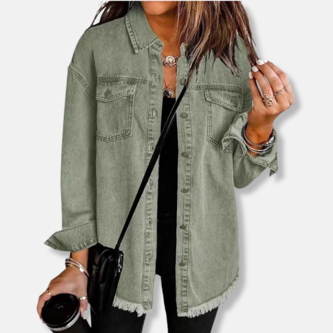 Women's oversized denim shacket with raw edge hem and button front closure for effortless fall layering