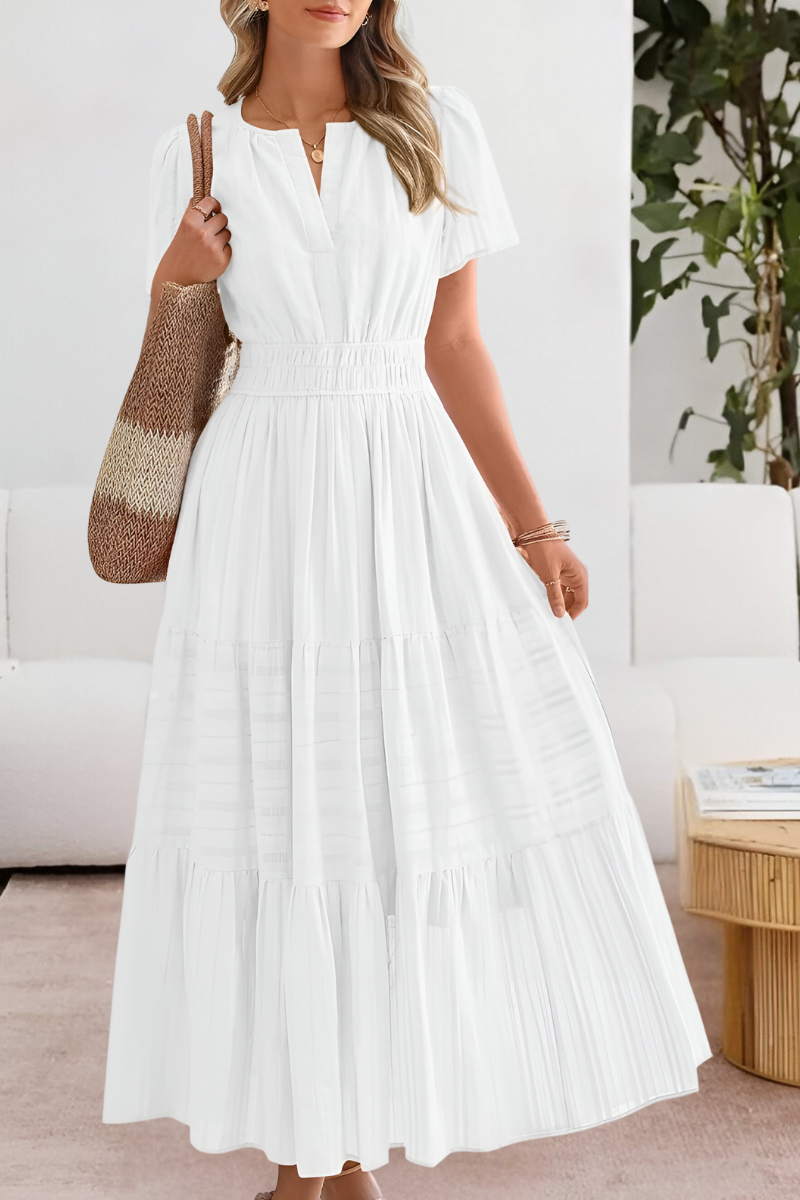 Cindy boho summer dress flowy silhouette breathable lightweight fabric in soft neutral tones