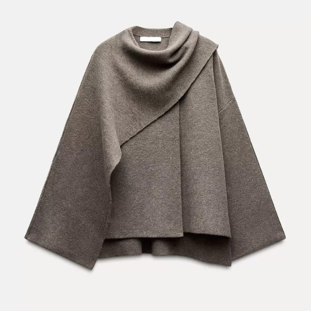 Women's soft wool blend poncho cape in neutral tones, asymmetric hem, draped silhouette for fall