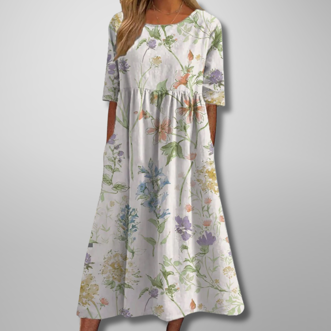 Relaxed floral midi dress with flowing cut in soft feminine print for effortless everyday elegance