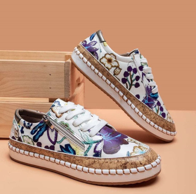 Women's floral embroidered lace-up sneakers with side zip and cork-style platform sole