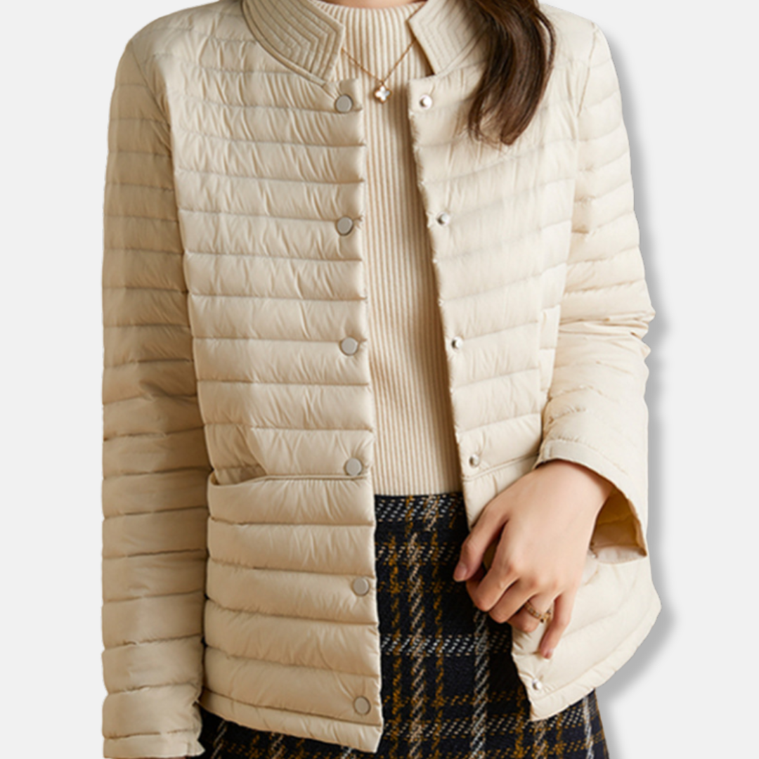 Women's slim-fit quilted jacket with stand collar, short length woven blend in neutral tone