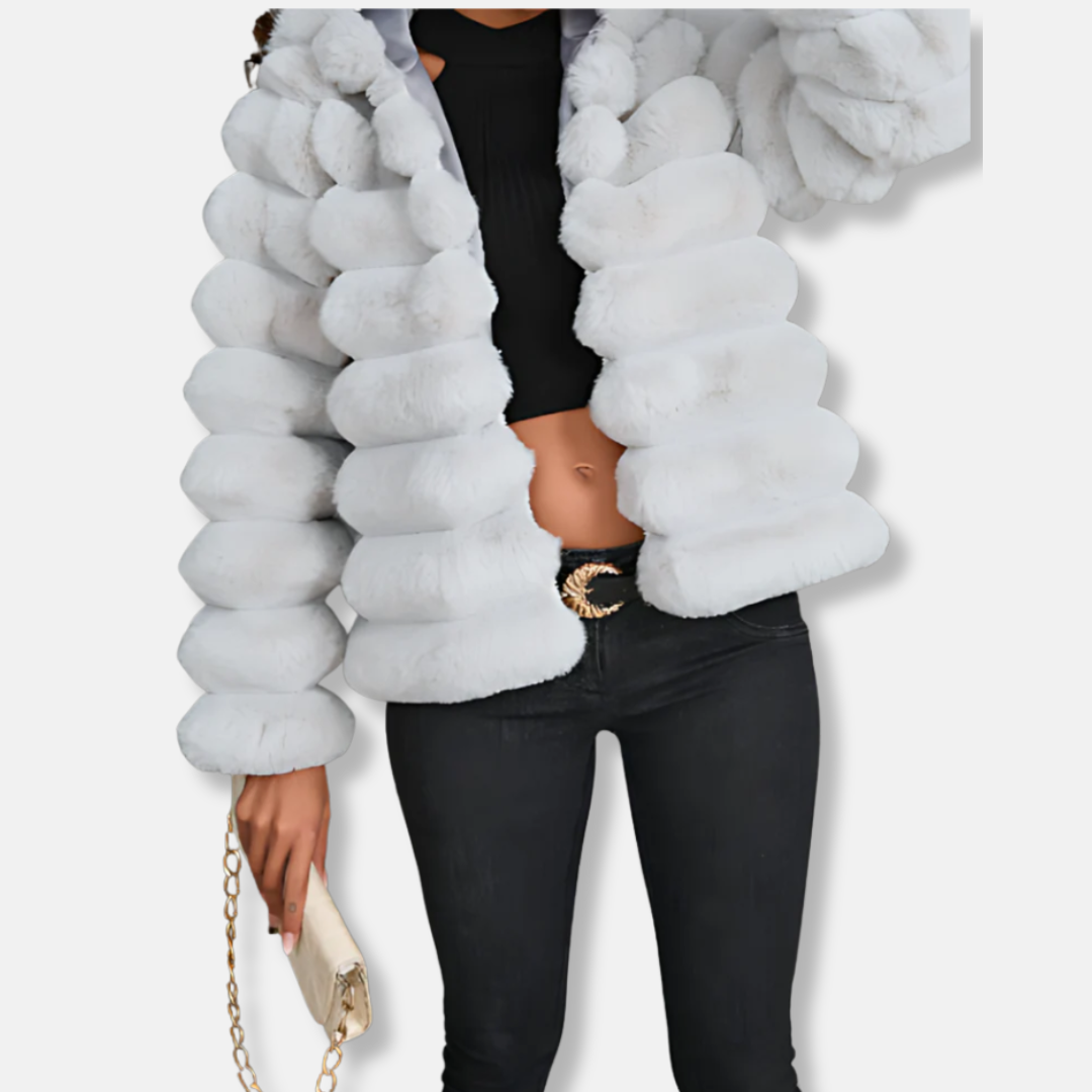 Women's white faux fur cropped jacket with stand-up collar and long sleeves for chic winter evenings