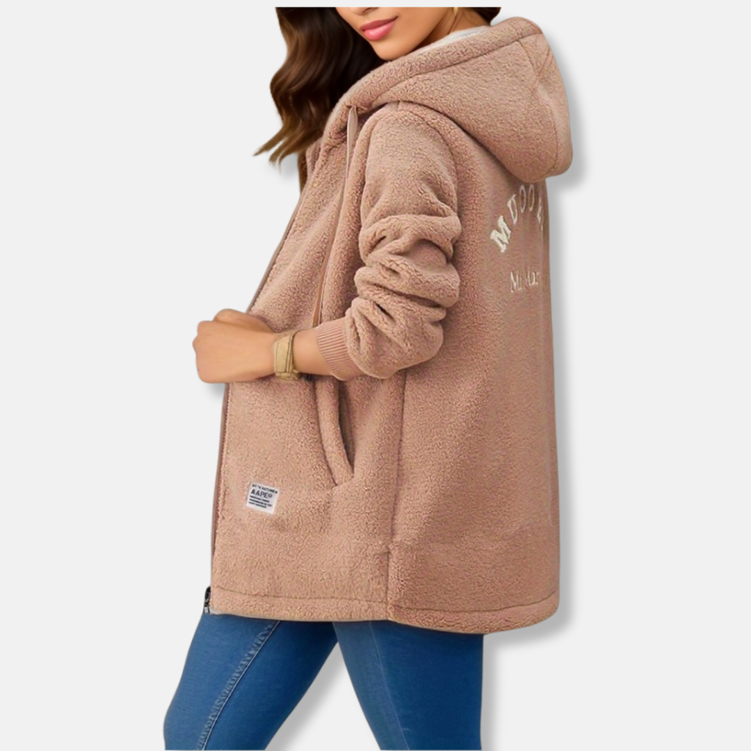 Women's oversized mid-length hooded jacket in plush faux vegan leather with zipper front closure