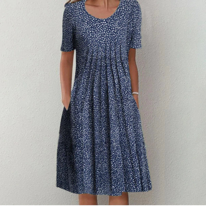 Casual floral dress with flattering silhouette and practical side pockets for everyday wear