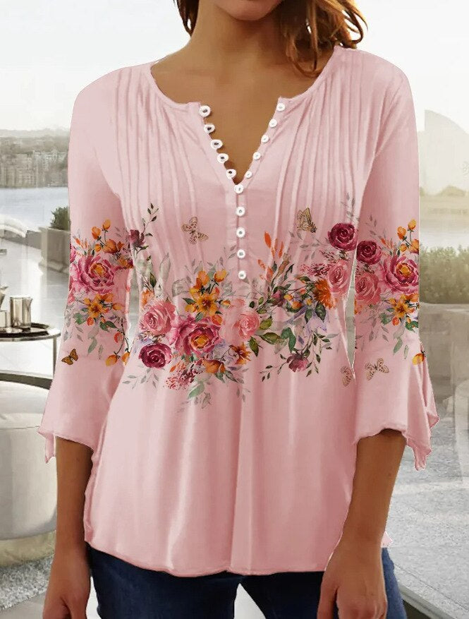 Floral blouse with scalloped neckline, flowing pleats, feminine everyday style for women