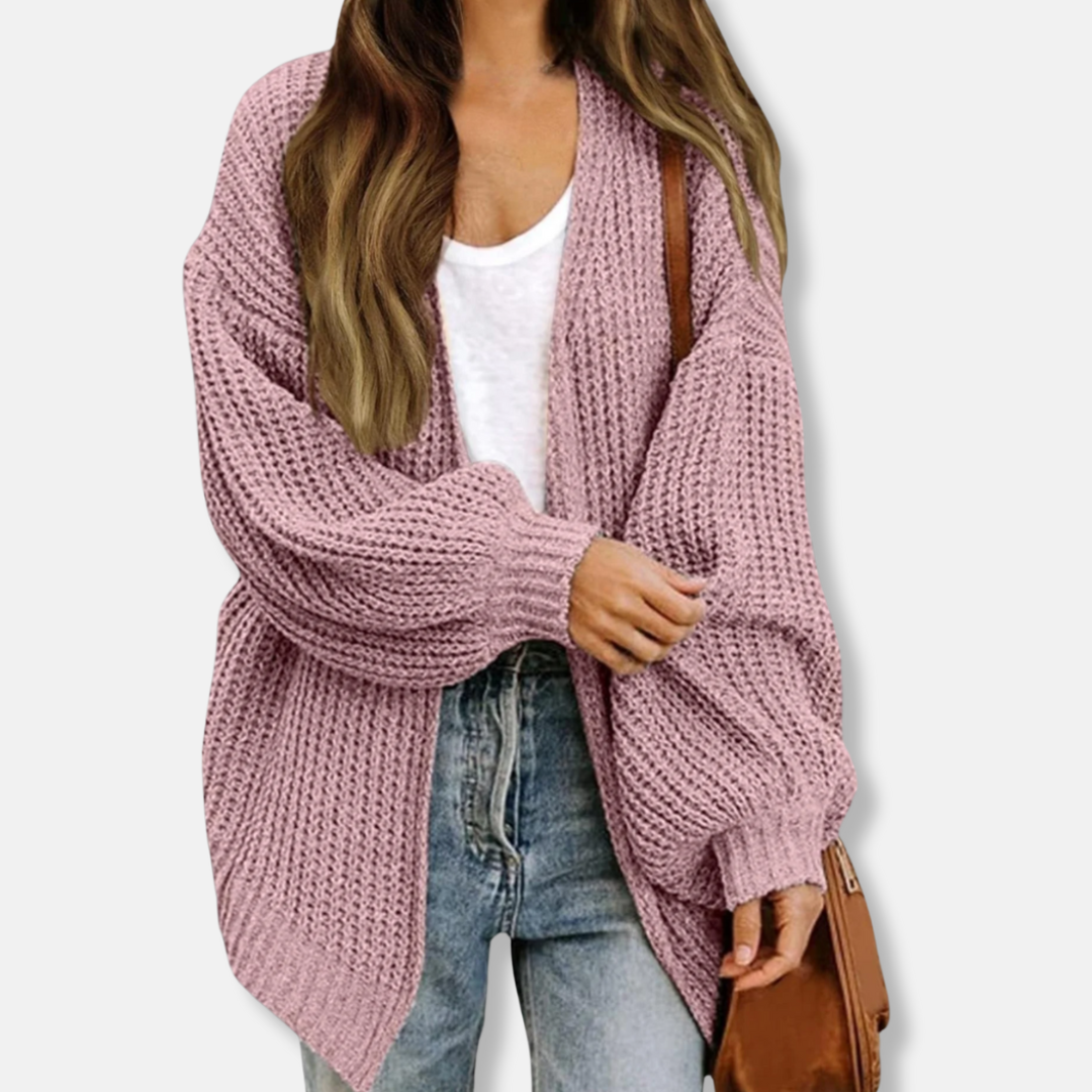 Women's oversized knit cardigan with lantern sleeves tapering to ribbed cuffs for refined layering