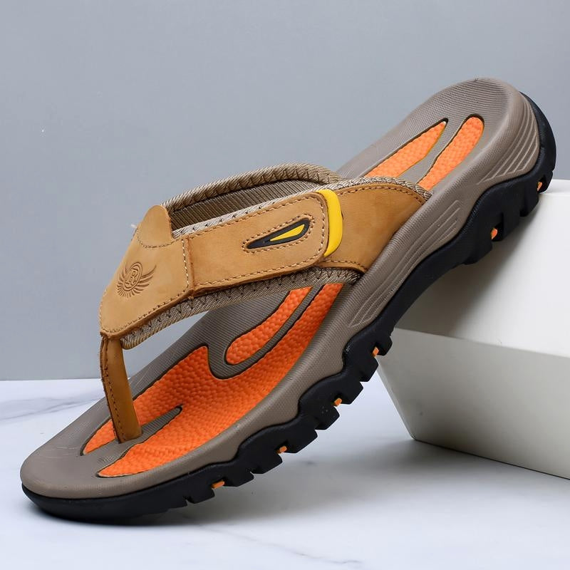 Brown leather sandals with structured straps and cushioned shock-absorbing sole for all-day comfort