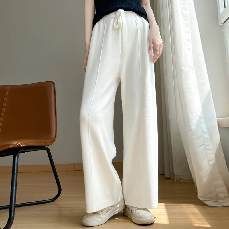 Ivory wide-leg cashmere pants high-waist relaxed silhouette soft premium blend lounge wear