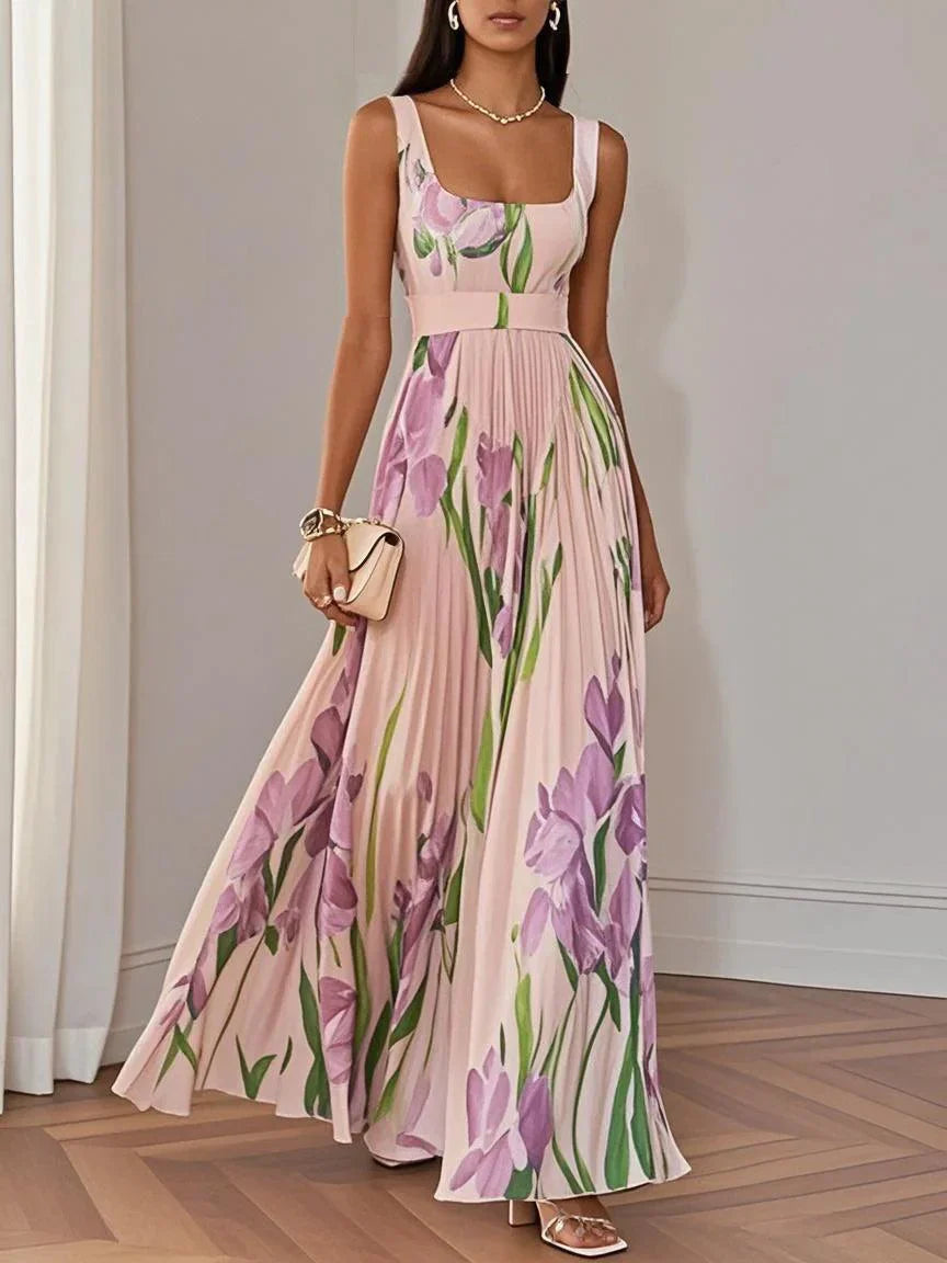 White pleated floral chiffon maxi dress with square neckline and flowing A-line silhouette