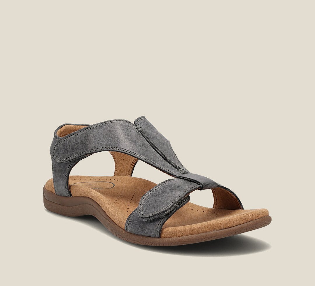 Women's vegan leather comfort sandals with cushioned support, neutral tones, and elegant minimalist strap design