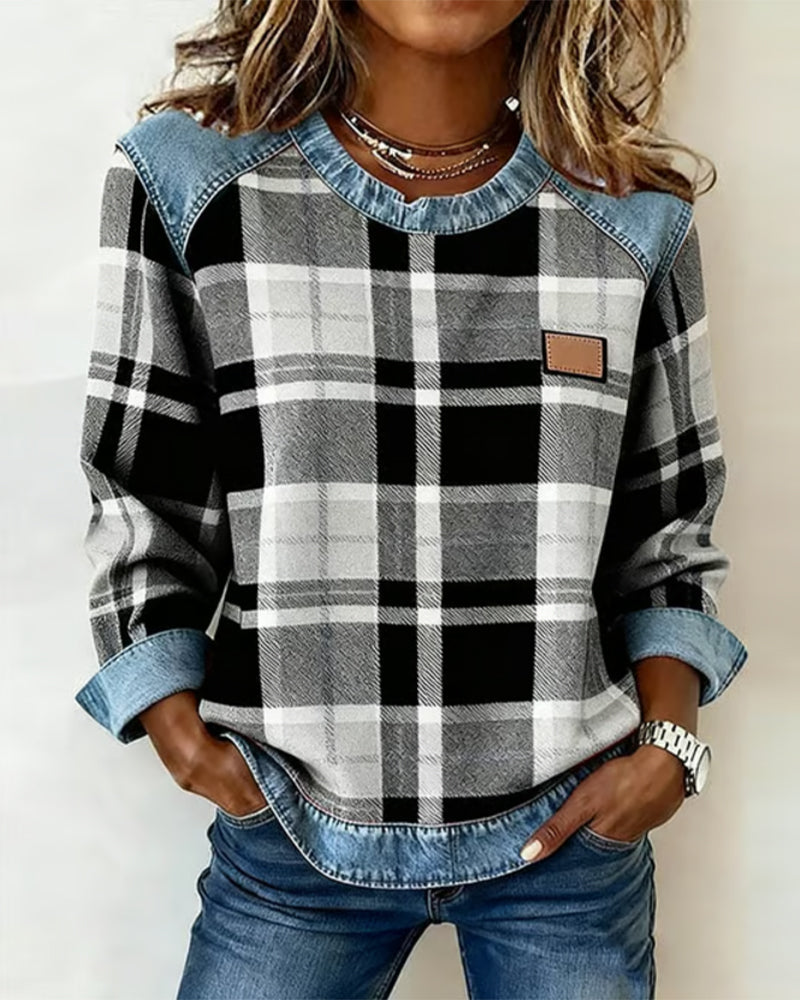 Casual oversized sweatshirt with colorful checkered patchwork panels, relaxed fit streetwear style