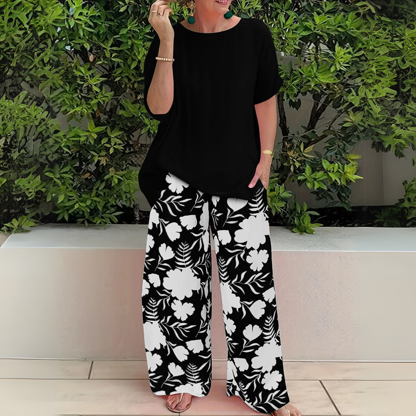 Elegant floral two-piece set in flowing fabric with flattering relaxed fit and timeless feminine design