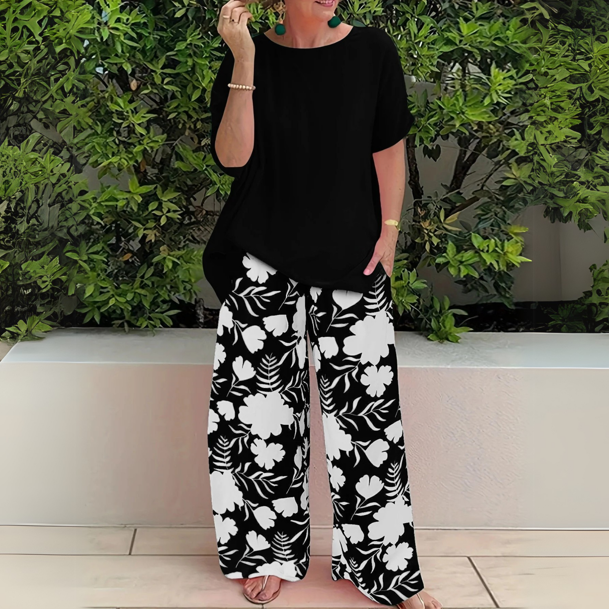 Elegant floral two-piece set in flowing fabric with flattering relaxed fit and timeless feminine design