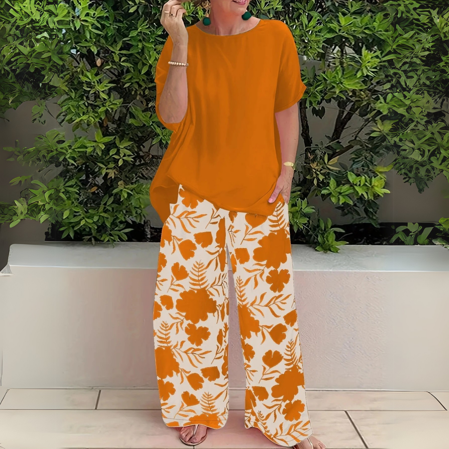 Elegant floral two-piece set with flowing fabric, flattering fit in timeless feminine style