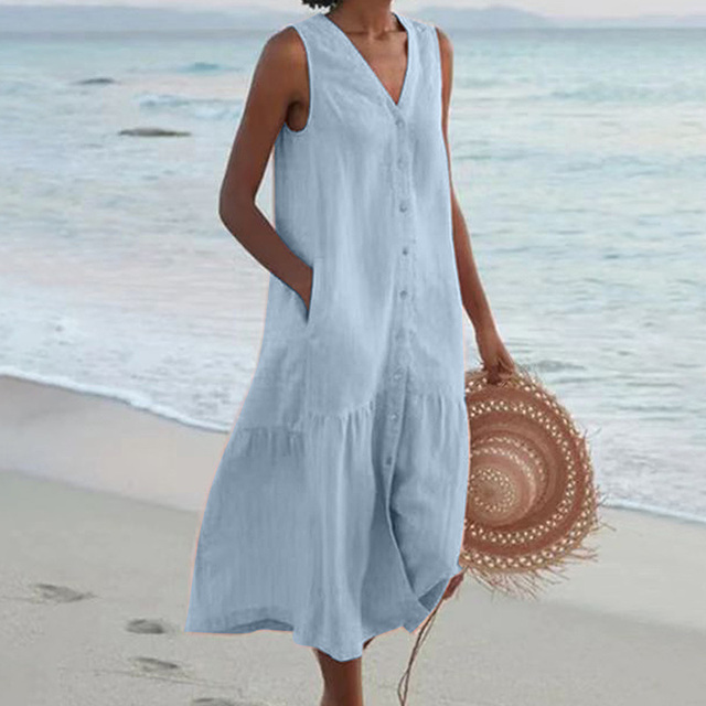 Sleeveless buttoned midi dress in solid color with slimming silhouette and chic front button detail