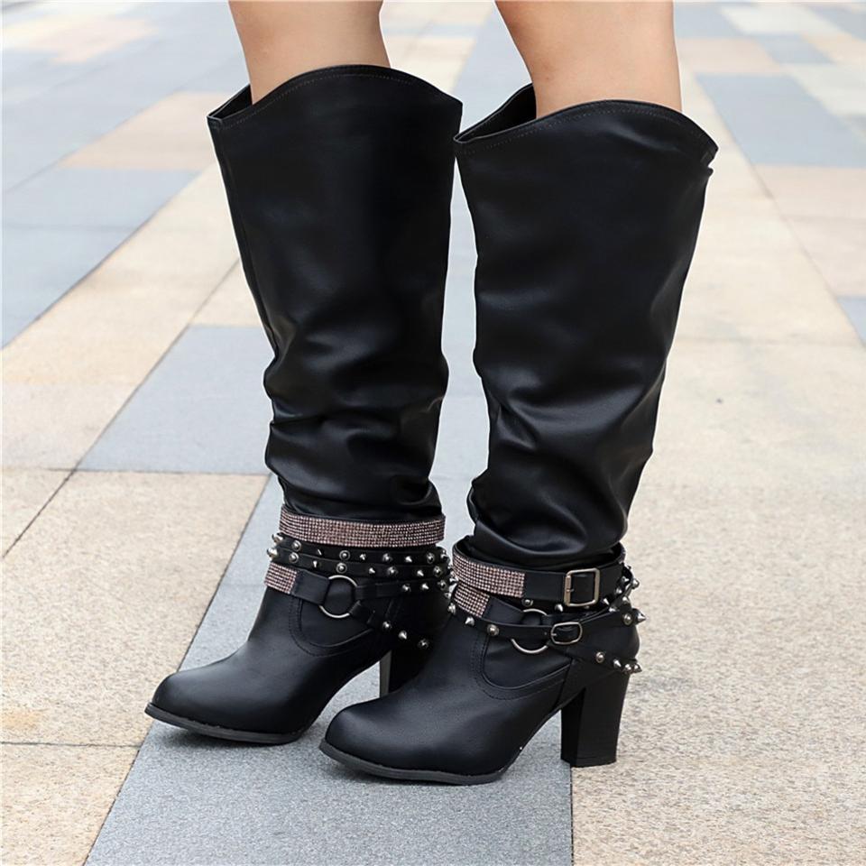 Women's black slouchy knee-high boots with block heel, leg-lengthening silhouette for effortless chic style