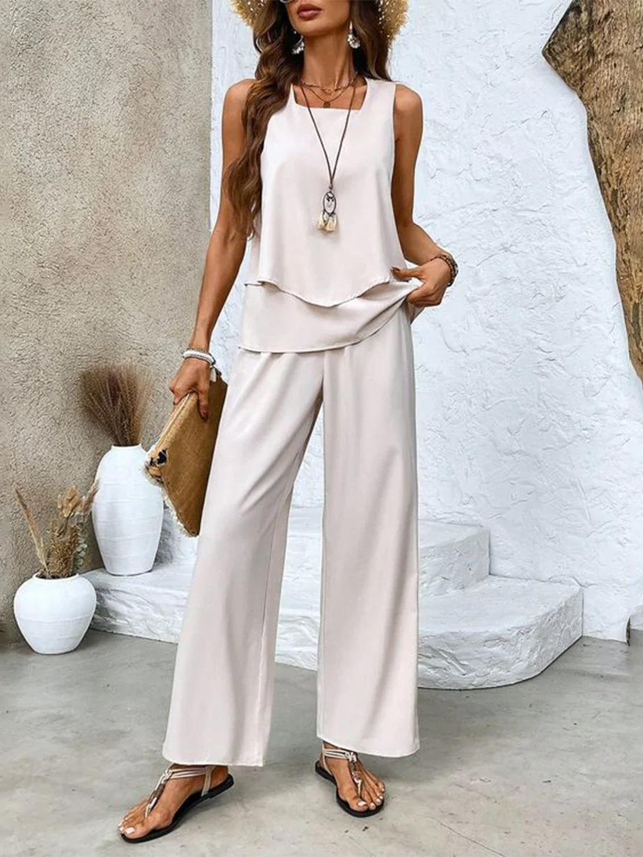 Chic two-piece set flowy sleeveless blouse wide-leg pants breathable fabric elegant casual style