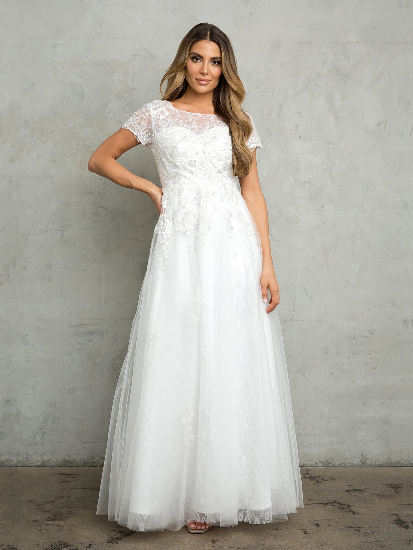Long formal A-line mother of the bride dress in elegant floor-length silhouette with structured waist