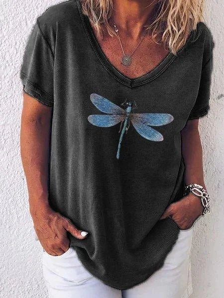 Washed-pink women's casual V-neck tee with delicate blue dragonfly chest graphic, short sleeve