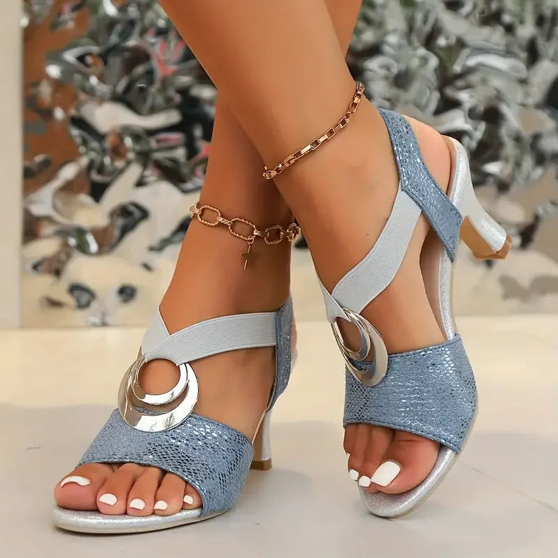 Women's comfort flat sandals in neutral tone with arch-supporting footbed and elegant strap design