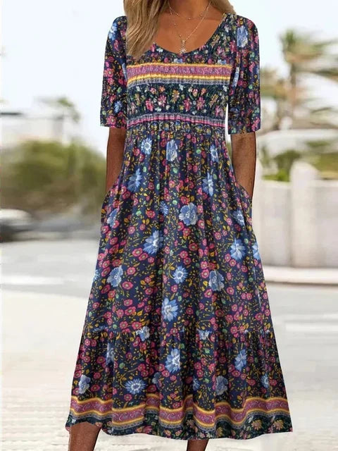 Boho print midi dress with round neckline, flowing relaxed fit in vibrant artistic pattern