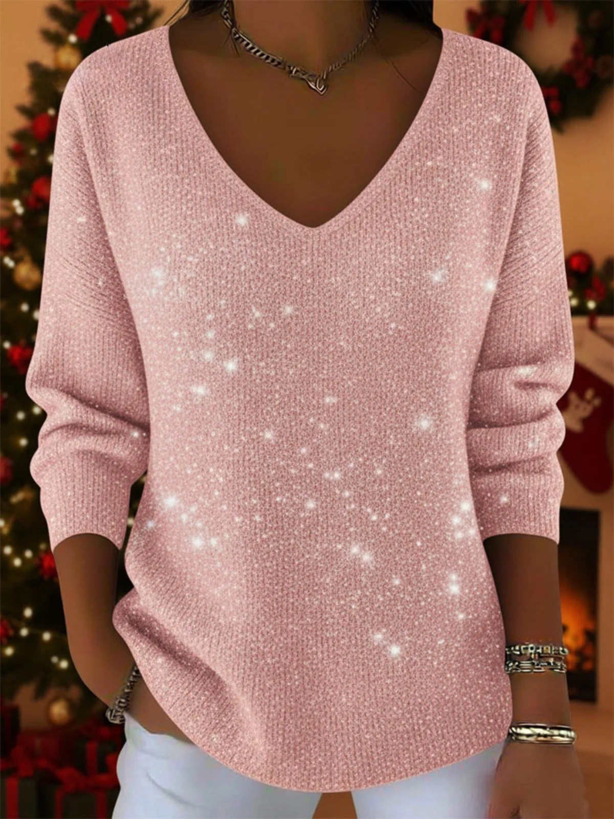 Festive red V-neck jumper with flattering elongating cut and seasonal charm