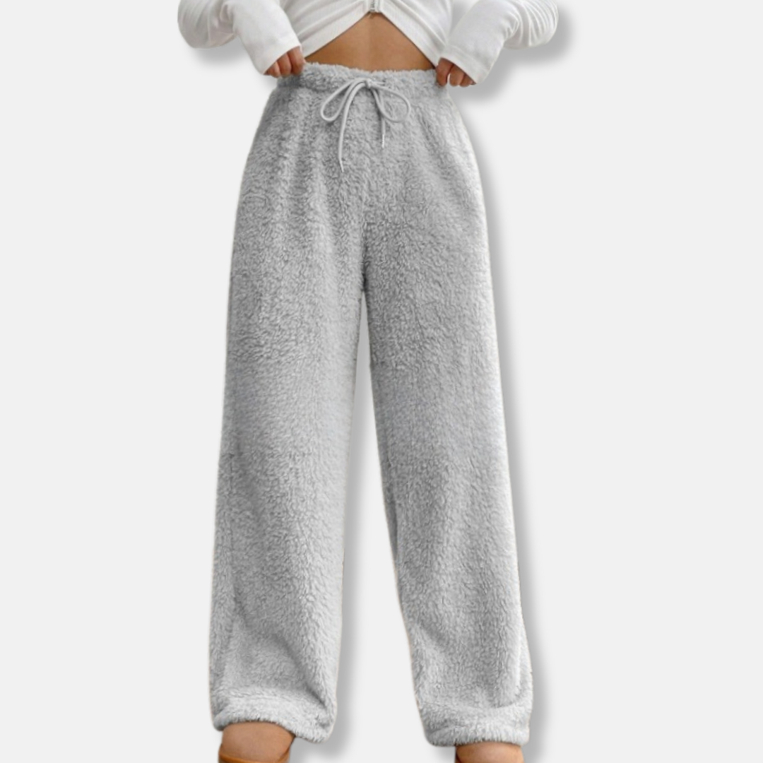 Women's plush fleece lounge pants in wide-leg loose fit with adjustable drawstring waist, full length