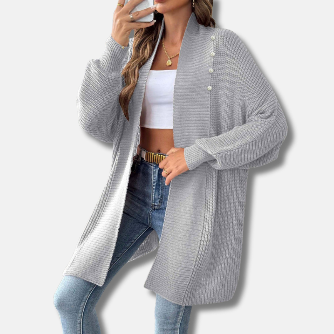 Women's longline acrylic knit cardigan with shawl collar and elegant pearl button closure