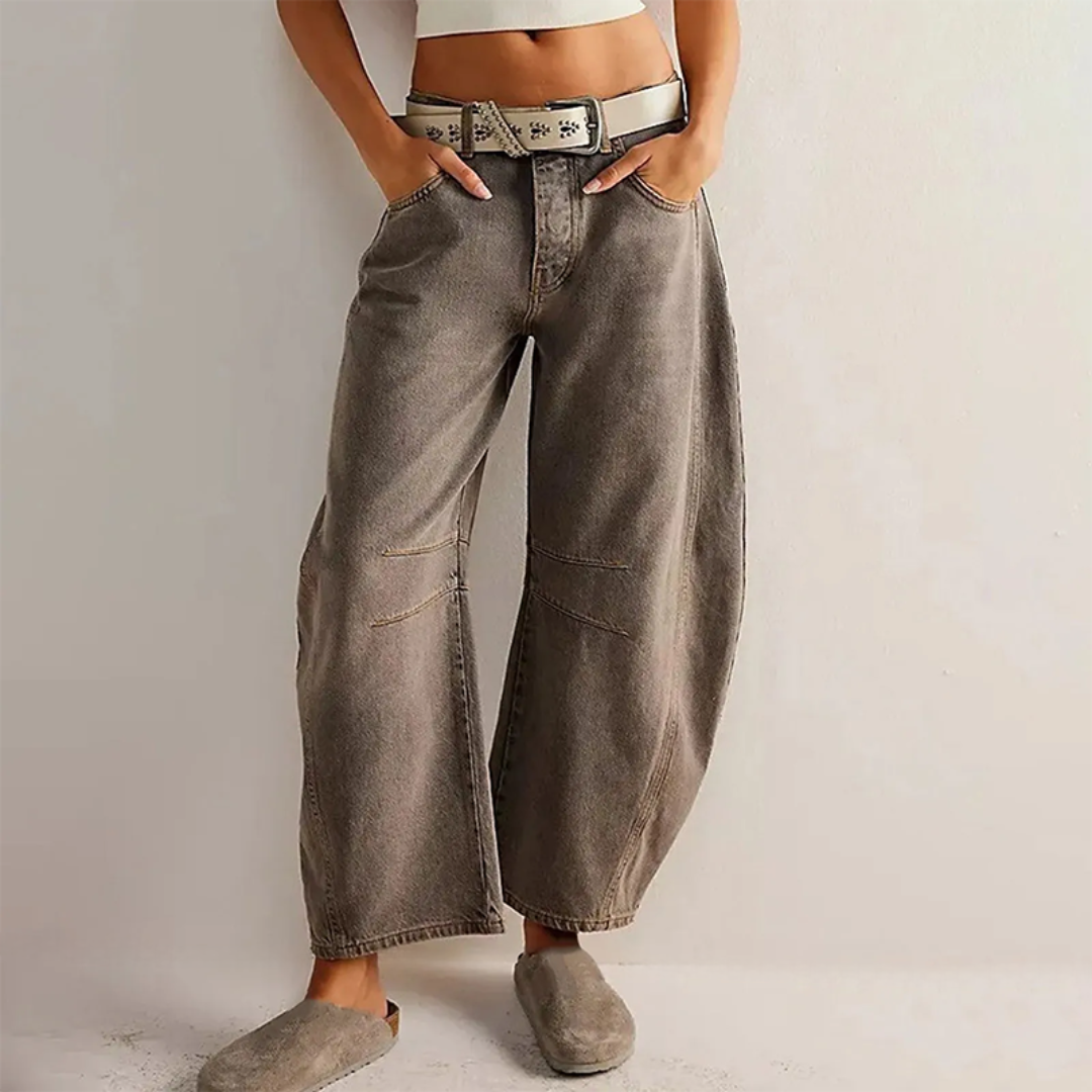 Women's high waist barrel leg jeans relaxed fit light acid-wash denim sculptural silhouette