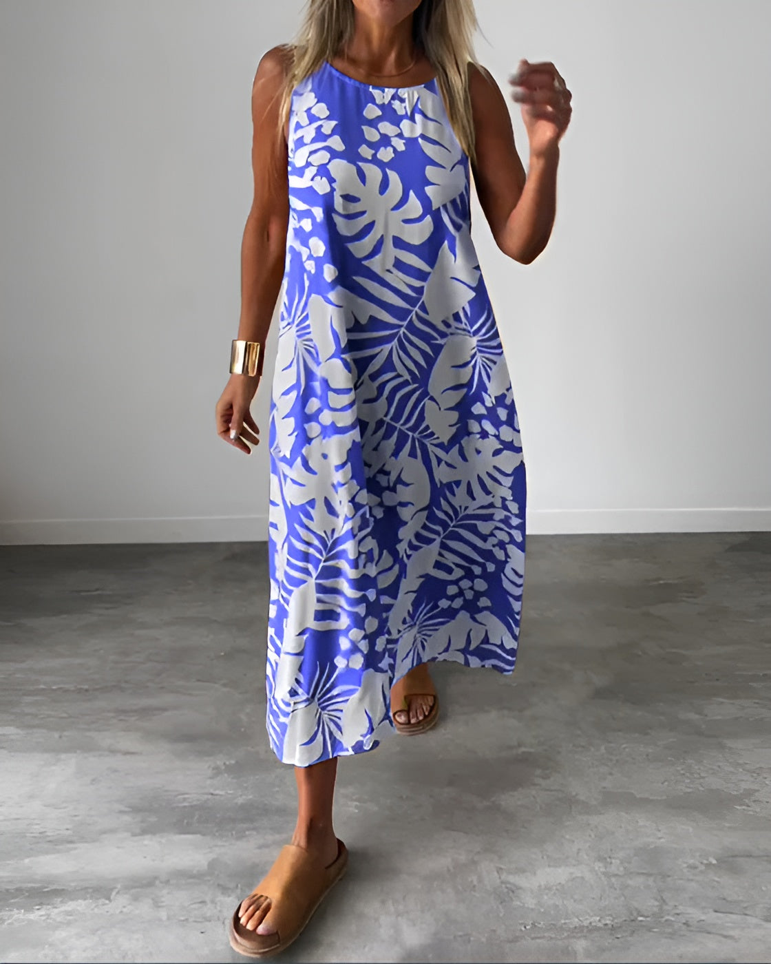 Women's sleeveless draped evening dress in elegant silhouette with waist-defining figure-flattering cut