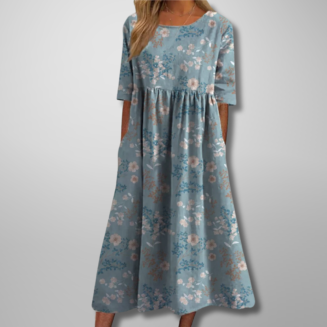 Relaxed floral midi dress with flowing cut in feminine print, effortless everyday elegance