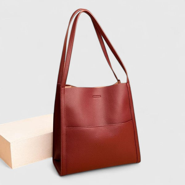 Thora minimalist shoulder bag in neutral tone, sleek structured silhouette with clean lines