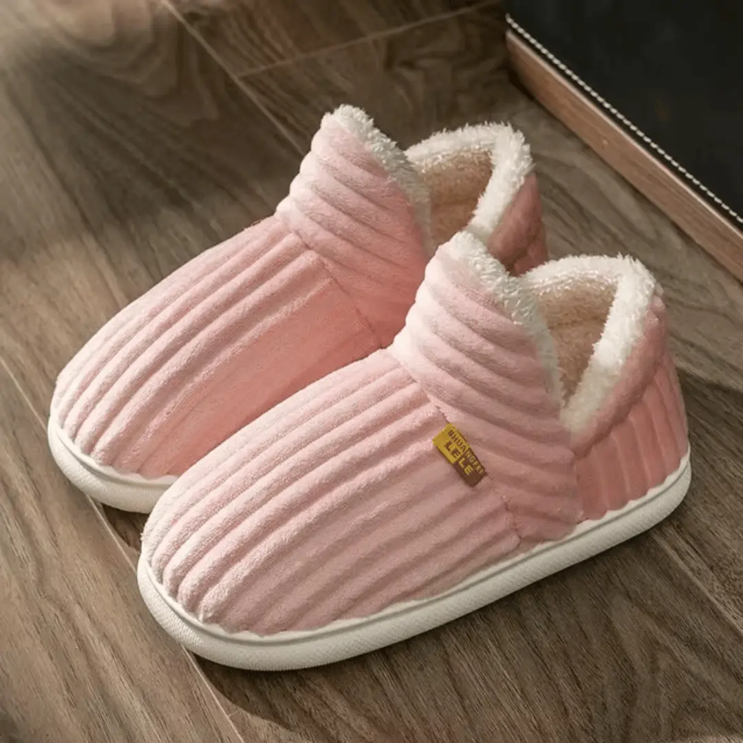 Cozy slip-on sherpa fleece slippers with non-slip rubber sole for indoor comfort