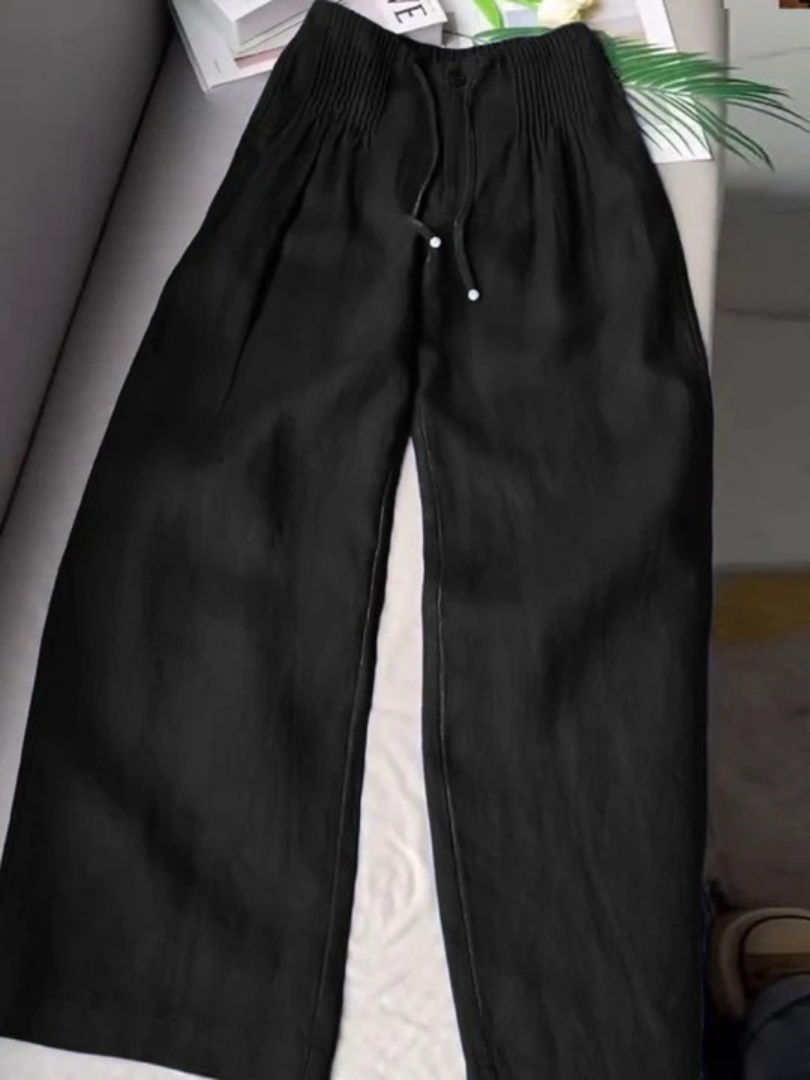 Black wide-leg pants with relaxed fit and flowing silhouette for effortless everyday elegance