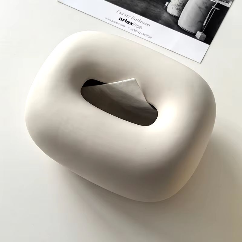 Artisan-crafted ceramic tissue box with smooth finish, clean lines, and neutral tones for any room