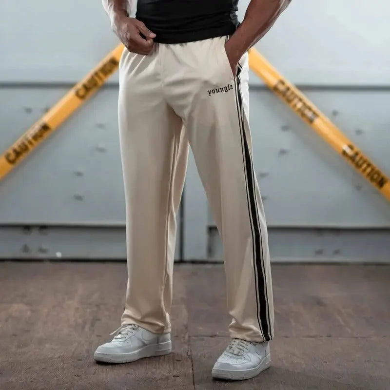 Apollo gray urban sweatpants with white bold side stripes and elastic waistband for everyday comfort