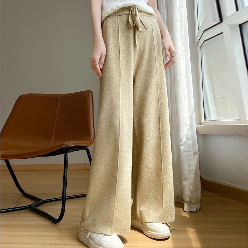 Ivory wide-leg cashmere blend pants high-waist relaxed silhouette cozy luxurious drape lounge wear