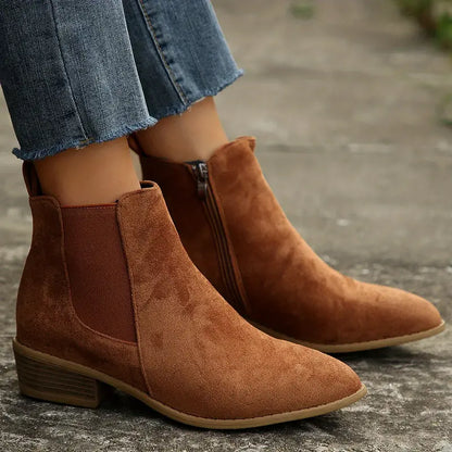 Anica™ sleek black ankle boots with polished silhouette and leg-lengthening streamlined design