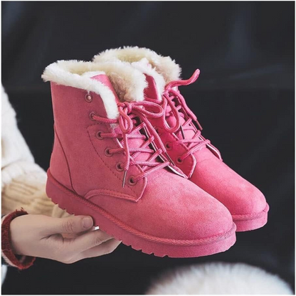 Women's black lace-up ankle boots with classic winter design and durable cold-weather construction