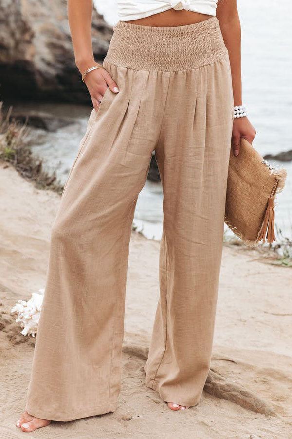 Women's wide leg vacation trousers in flowy high-waist cut, breezy silhouette for effortless summer style