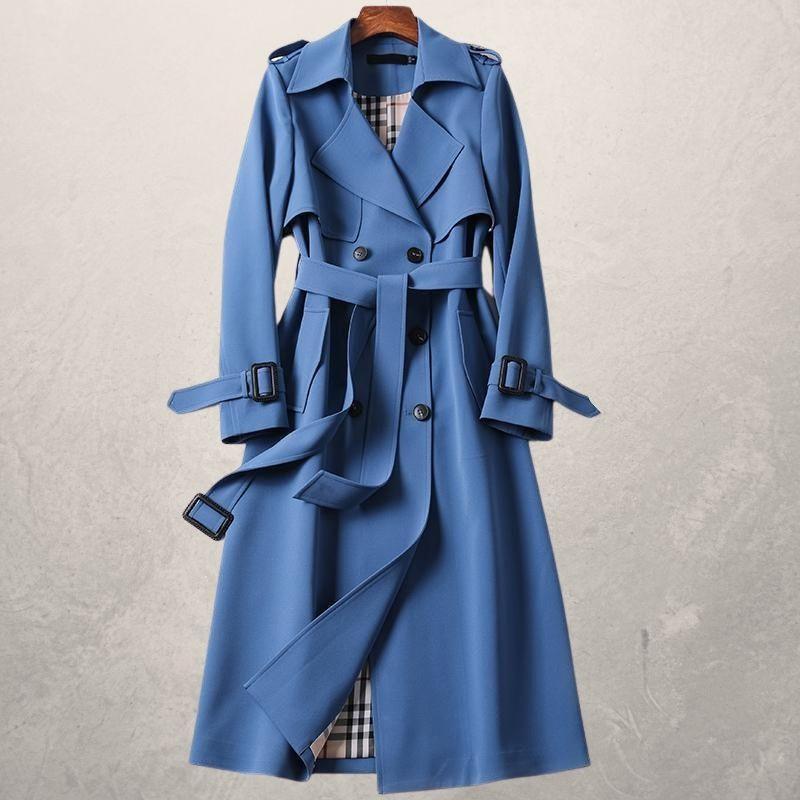 Beige double-breasted trench coat cross-front closure adjustable belt elegant tailored silhouette