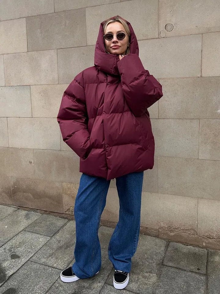 Women's black sleek puffer jacket with maximum insulation quilted design for winter warmth