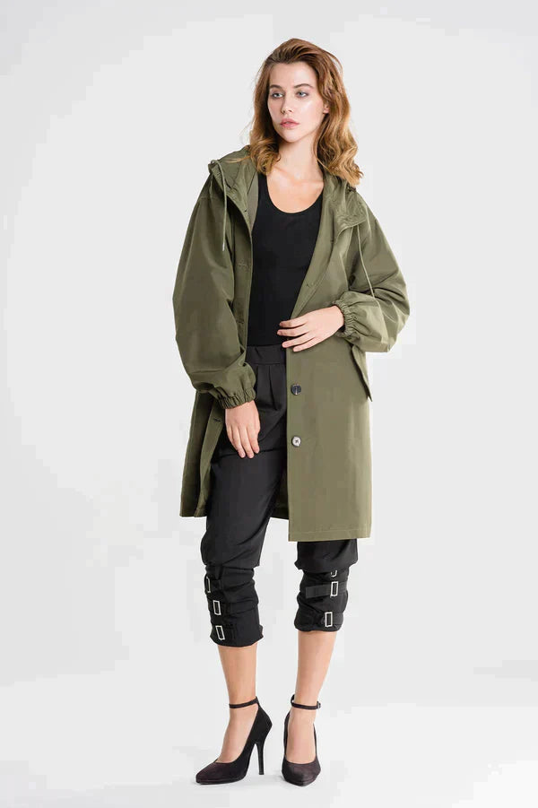Women's lightweight hooded rain jacket relaxed fit water-repellent layer in neutral everyday outdoor style