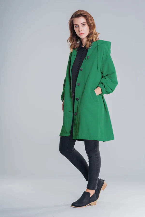 Women's lightweight hooded rain jacket relaxed fit water-repellent shell in neutral everyday outdoor style