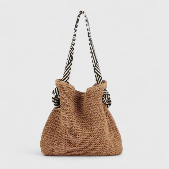 Bohemian shoulder bag with braided structure, patterned straps, natural tones, casual summer style