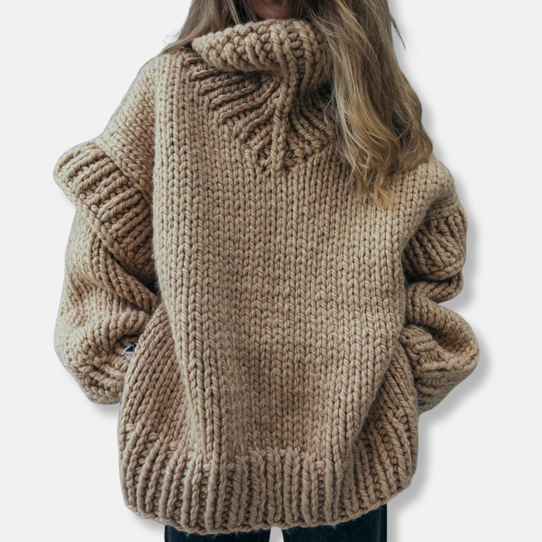 Women's oversized chunky knit wool turtleneck pullover sweatshirt in cozy autumn winter style